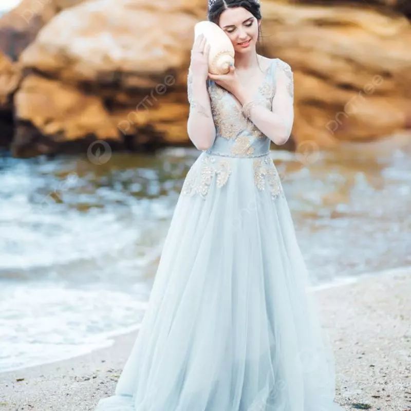 Pilih Dress dengan Warna Cerah atau Netral dan Detail yang Minimalis
